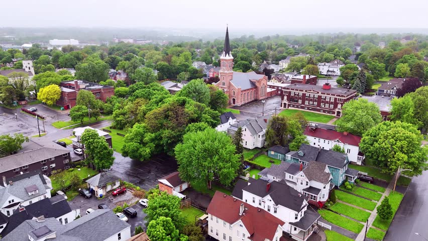 Passing over homes, residences, apartments, and parks as the view captures a slice of life on the north side.