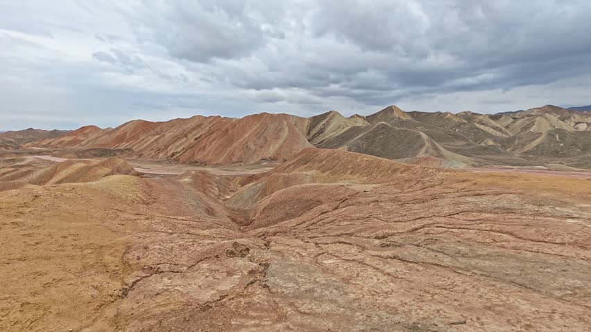 Red mountainous landscape with dramatic geological formations vibrant shades of red colored earth.