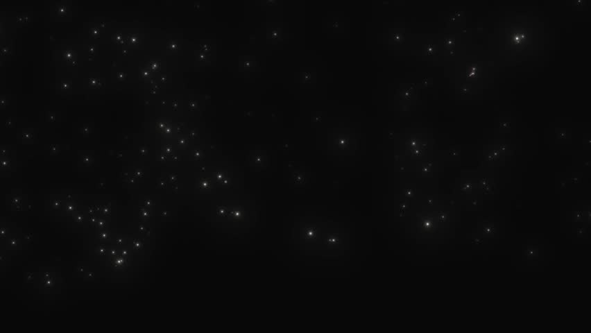 Vibrant fireworks explode in colorful bursts of pink blue yellow and orange against a dark night sky