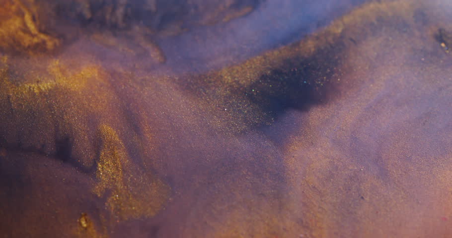 Flow spatter. Color stream. Defocused yellow blue neon bright paint liquid particles sparkling splash floating on abstract background.