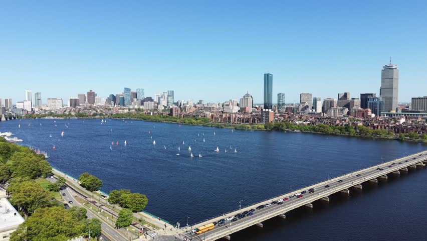 Aerial view of Boston skyline and sailboats on the Charles River in Massachusetts, USA on a clear summer day. g.