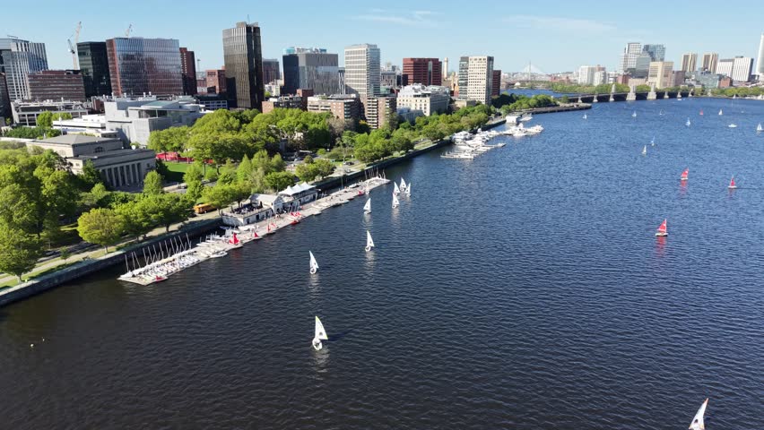 Aerial view of Boston skyline and sailboats on the Charles River in Massachusetts, USA on a clear summer day. g.
