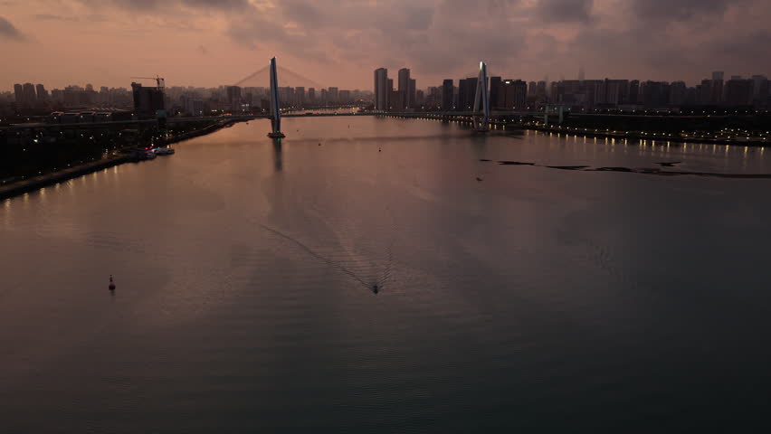 Haikou city skyline sunrise aerial view near Century Bridge, Hainan, China