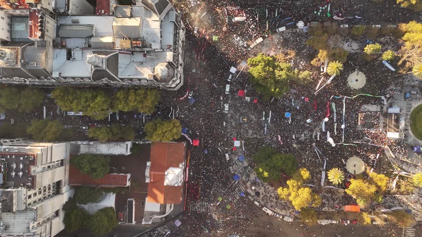 University protest in Plaza de Mayo, Buenos Aires, Argentina. Aerial drone top-down ascending