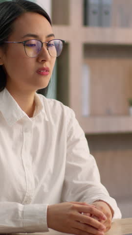 Stressed exhausted Asian Japanese business woman office rubbing eyes fatigue businesswoman female Chinese Korean overworked girl unhealthy work laptop take off glasses suffer pain eyestrain bad vision