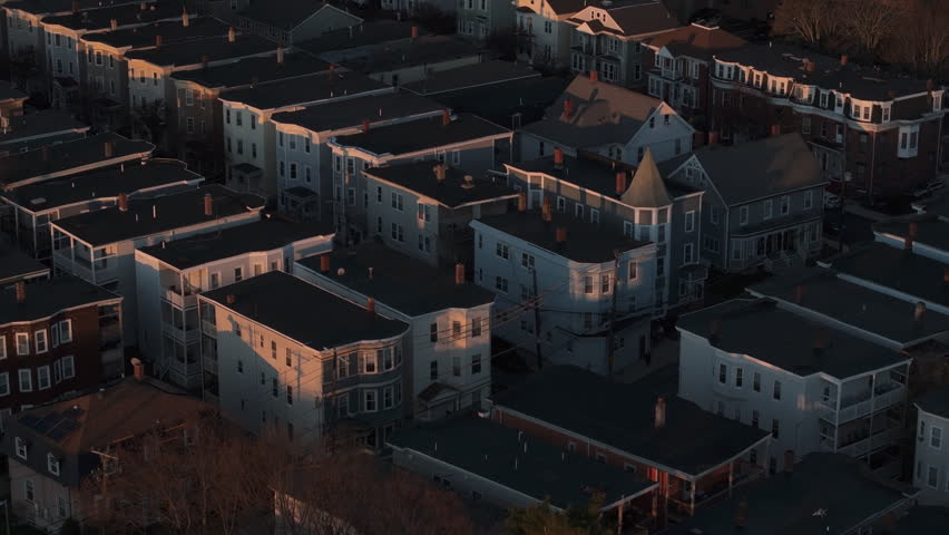 Aerial view of homes in Dorchester, Boston at sunrise. Shot on a spring morning.