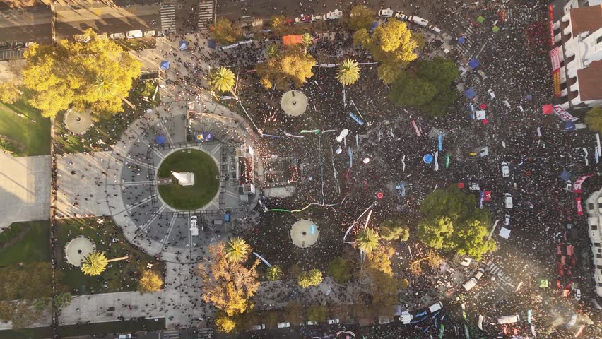 Massive crowd of protesters gathered for demonstration in Plaza de Mayo, Buenos Aires, Argentina. Aerial top-down view