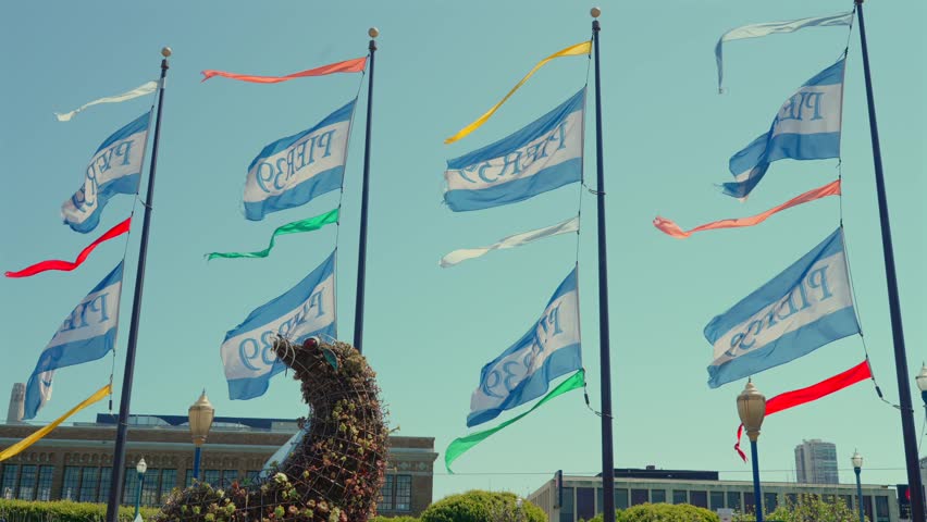 Pier 39 Flags and Sea Lion Sculpture at San Francisco Waterfront