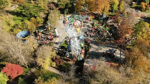 Aerial Orbit above Ferris Wheel Park
