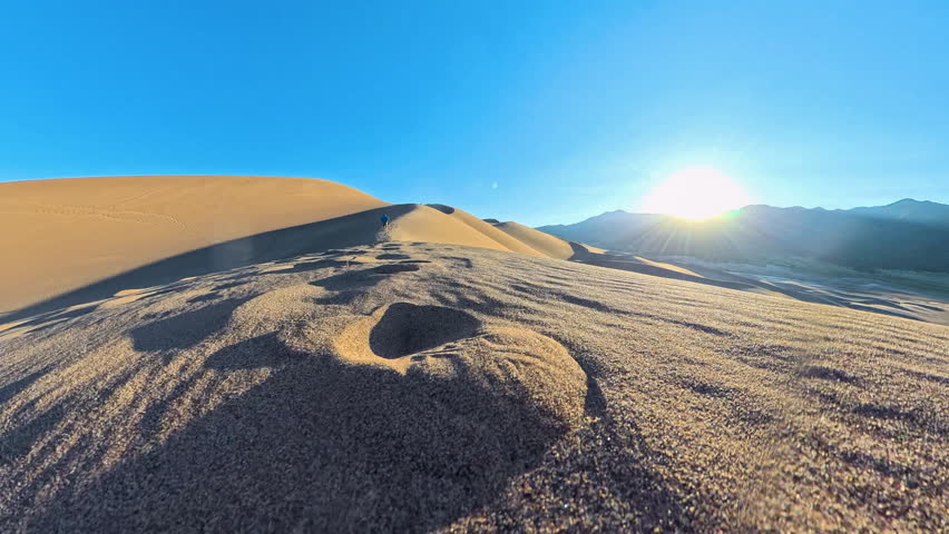 Low Angle Over Glistening Dunes in Great Sand Dunes National Park