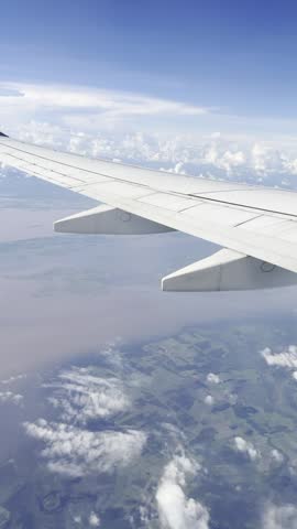 BEAUTIFUL PLANE VISION OF  LANDSCAPE WITH CLOUDS AND CITY