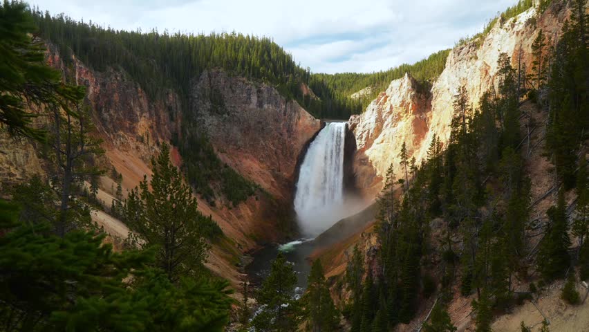 Inspiration Point Grand Canyon of the Yellowstone Brink of Lower Falls Red Rock Point Lookout Point cascading waterfalls Yellowstone National Park Wyoming USA nature landscape sunny morning clouds
