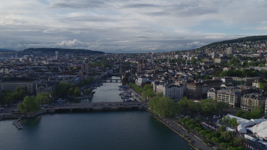 Establishing aerial view of Zurich skyline, stunning perspective of largest city in Switzerland.