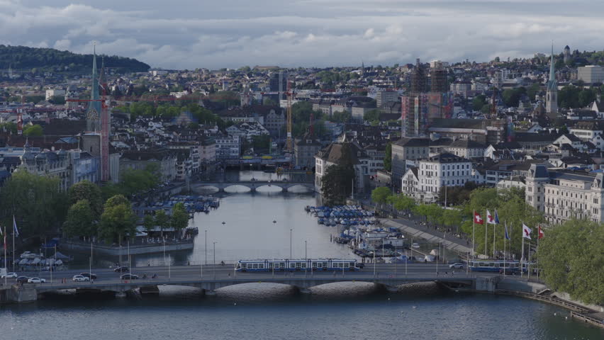Establishing aerial view of Zurich skyline, stunning perspective of largest city in Switzerland.