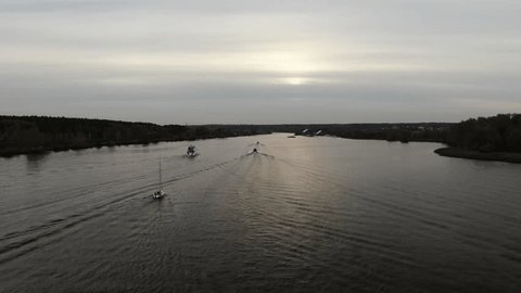Drone Flying Forward over Wide River Mytishchi