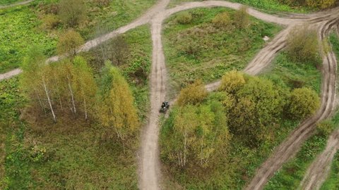 Drone Flying Forward Tilting Down over Atv