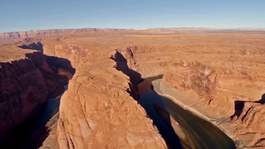Aerial footage of spectacular Grand Canyon landscape in Xinjiang, China. deteriorating climate documented timespan of one hour background 4K