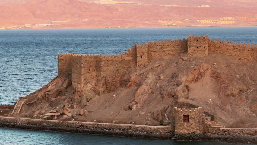 Close up panorama of Citadel of Saladin fortress on rocky island in the Gulf of Aqaba. Pharaoh Island, Egypt
