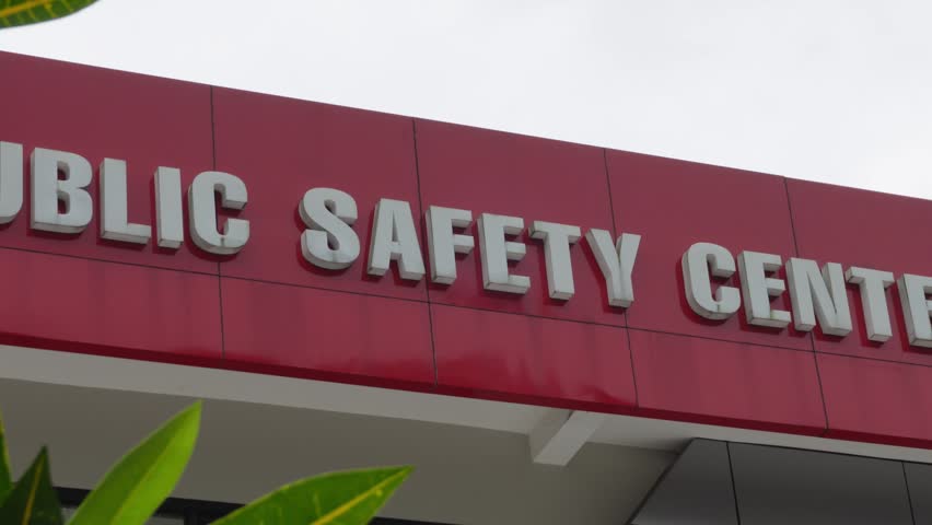 Public Safety Center 119 emergency service building signage on a red facade. Modern government facility for emergency response and community safety services.