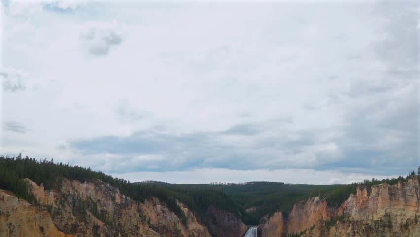 Grand Canyon of the Yellowstone cascading waterfalls Inspiration Point North Rim Dr Yellowstone National Park Wyoming USA Red Rock Point Lookout Point nature wide panoramic landscape cloudy sunset pan
