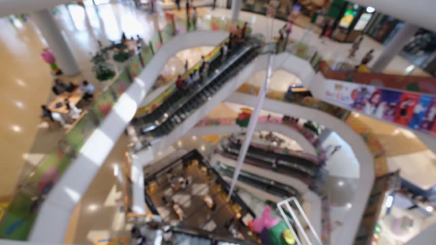 Modern Shopping Mall Interior Aerial View, Escalator Balcony Retail Store, Bright Spacious Multi Level Blur Crowd Commercial Center Interior