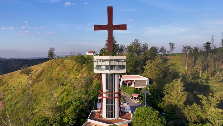 Cable Car Station In Aparecida Sao Paulo Brazil. Bird Eye View Of Church Standing Tall Amidst Beautiful Scenery. Town Sky Backgrounds Urban. Town Drone View Panning Wide. Aparecida Sao Paulo.