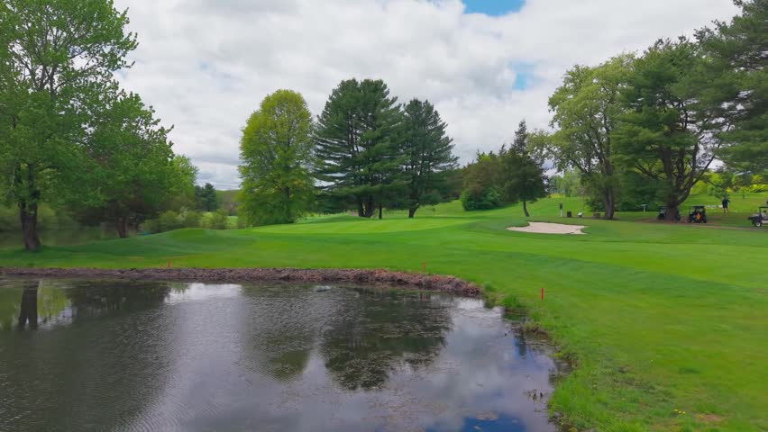Aerial view in the spring featuring a Connecticut Golf Course