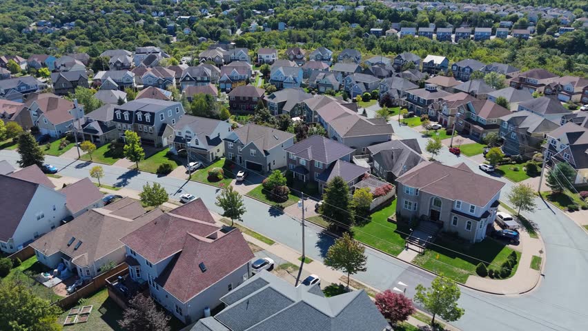 Aerial Modern Suburb Halifax Canada Large Houses With Fenced Yards And Driveways Quiet Residential Neighborhood Real Estate Opportunity 4K 