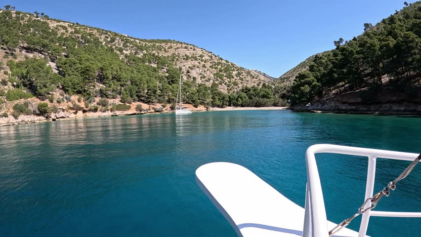 Sailing toward peaceful lagoon on Brac island, Croatia