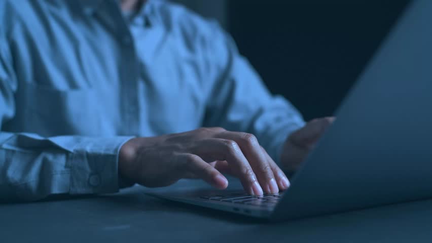 Futuristic concept of an AI-powered document management system (DMS). A businessman is working on a laptop with a virtual holographic interface displaying an artificial intelligence brain,