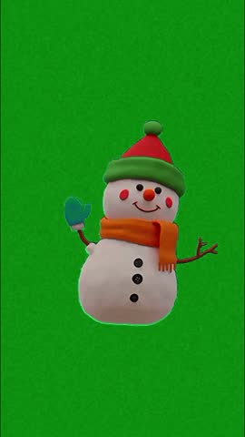 A smiling snowman with a carrot nose, coal eyes, and rosy cheeks, wearing a green and red hat, orange scarf, and blue glove on a green background