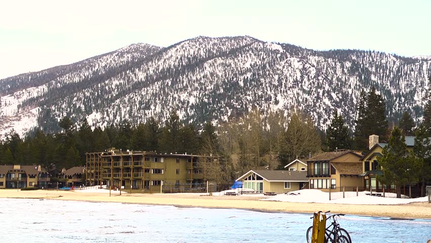Scenic shot of snow covered mountains and a lake