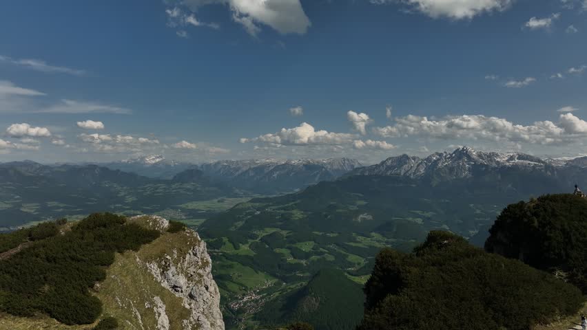 Austria cinematic aerial drone footage above dramatic Salzburg Alps mountain landscape near Untersberg. Scenic alpine peaks and panoramic nature views captured in 4K.