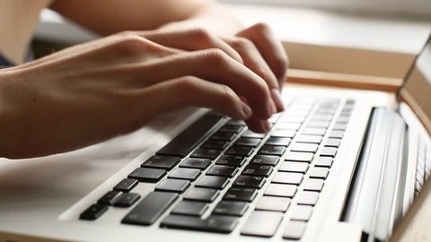 Women's hands typing on computer RUSSIAN keyboard (HD)