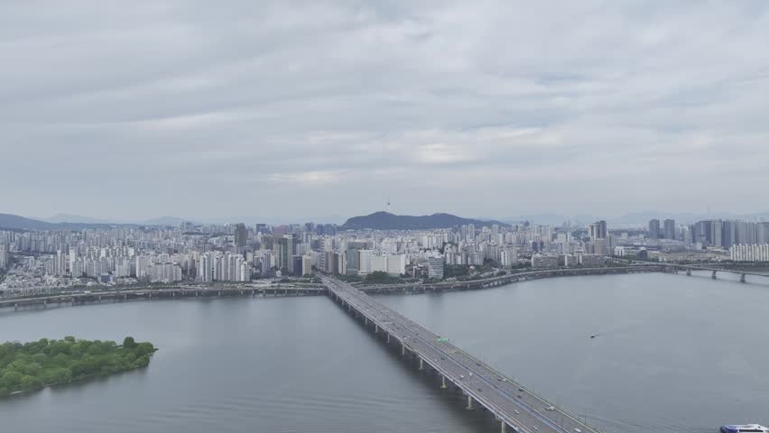 Aerial view of Bamseom Island and the Han River with the Yeouido skyline, Seoul, South Korea.