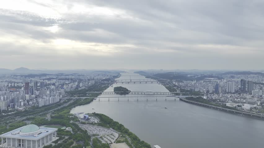 Aerial view of Bamseom Island and the Han River with the Yeouido skyline, Seoul, South Korea.