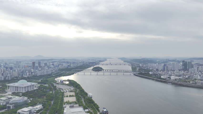 Aerial view of Bamseom Island and the Han River with the Yeouido skyline, Seoul, South Korea.