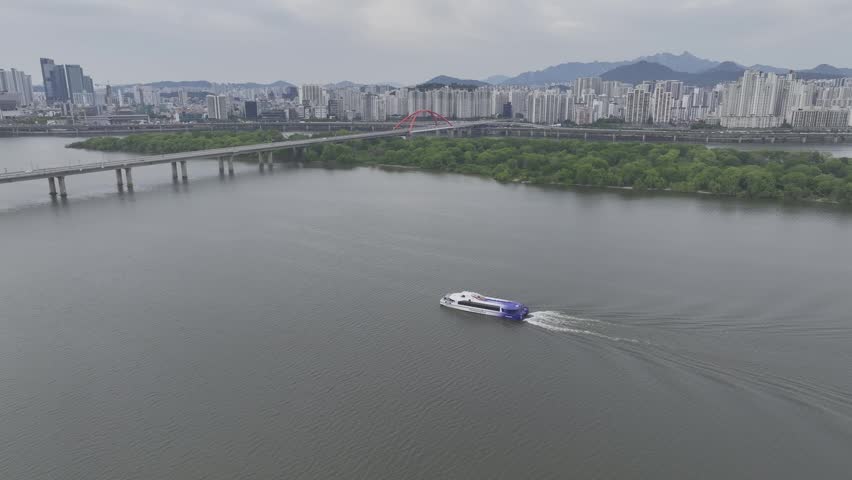 Aerial view of Bamseom Island and the Han River with the Yeouido skyline, Seoul, South Korea.