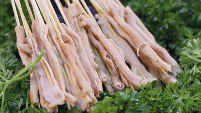 Hot pot ingredients: freshly skewered raw duck intestines