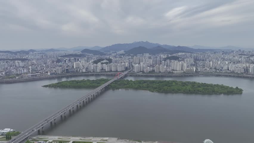Aerial view of Bamseom Island and the Han River with the Yeouido skyline, Seoul, South Korea.
