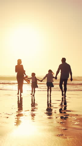 Walking, parents and girls holding hands for beach sunset, family holiday and weekend travel trip. Back, people and children with support for seaside vacation, mockup space and bonding on journey