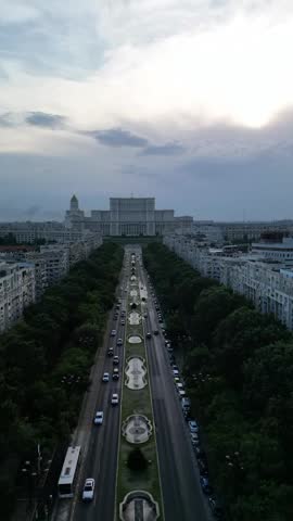 Aerial view of the Palace of the Parliament in Bucharest, Romania. Cinematic drone shot of the massive communist-era government building on a clear winter day