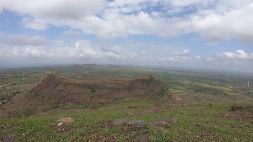 Timelapse of Bhamer Fort in summer with fast clouds over Western Ghats.