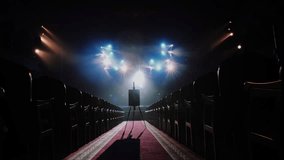 Artist Wooden Easel with Blank Canvas on Empty Stage in Spotlight Beams - Powered by Shutterstock - Get 15% off with code: PIKWIZARD15