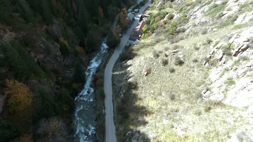 Panoramic drone view of nature landscape with mountains and forest