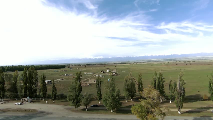 Panoramic drone view of nature landscape with mountains and forest