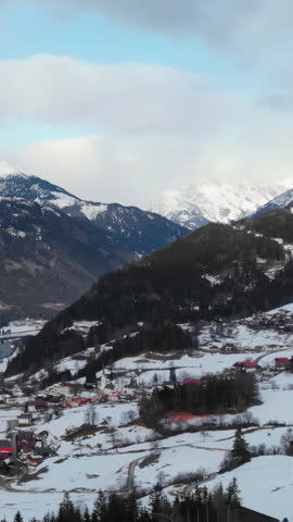 Scenic Mountain Landscape. Sunlit Snowy Valley With River. Warm Sunset Highlights Snowcovered Hills And River. Media