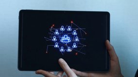 Interaction with digital network on a tablet showing connections between users and data points. - Powered by Shutterstock - Get 15% off with code: PIKWIZARD15