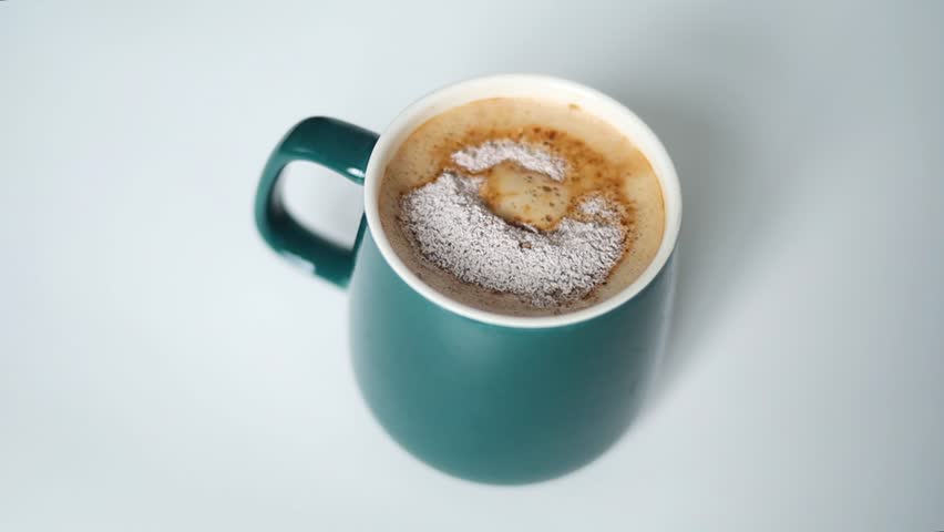 footage of cappuccino coffee in a glass