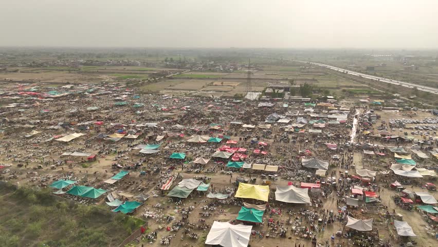 Aerial view of animal cattle farm, Kahna Kacha Bakra or Cow Mandi, Eid goat camel cattle market - Kahna Kacha, Punjab, Pakistan - 22 MAY 2026
